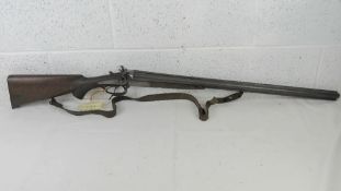 A deactivated German drilling double barrel combination hammer gun having engraved stag and fox