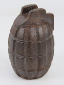 An inert WWII British Mills training grenade.