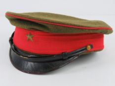 A WWII Japanese Army visor cap.