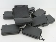 A quantity of small Peli transit cases with foam inserts, each approx. 16.5 x 10.
