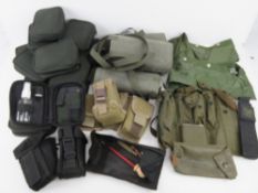 A quantity of assorted cleaning kits, pouches, ammo pouches and bandoliers.