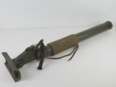 A deactivated US M19 60mm mortar, having safety and firing mechanism, sling, and heat shield.