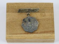 A WWII Japanese Navy pin badge in box.