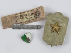 A WWII Japanese Time Expired Soldier's League Member's badge within box.