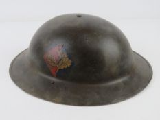 A reproduction WWII British South Nottinghamshire Hussars helmet.