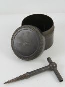 A WWII German bakelite fuse pot, together with a WWII German demolition screw.