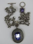 A statement necklace with large central pendant designed by Miglio using Swarovski crystal,