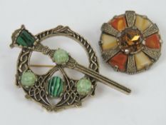 Two Celtic style costume jewellery brooches, one made by Miracle.