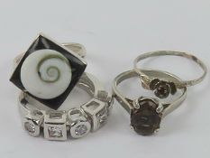 Four silver rings size K-L, including sm