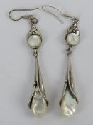 A pair of silver and mother of pearl earrings in the Art Nouveau style, stamped 925, 8cm drop.