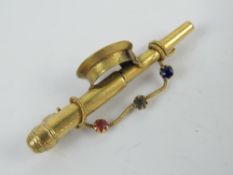 A Naval themed sweetheart brooch having sailors cap, telescope and 'Red, White & Blue' paste stones,