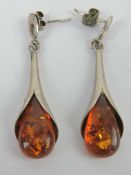 A pair of silver and Baltic amber earrings in the Art Nouveau style, stamped 925, 4.5cm drop.