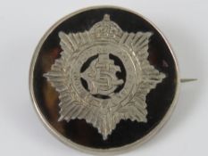 A WWI HM silver and tortoiseshell regimental sweetheart brooch having inlaid emblem for the Army