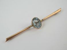A delightful 9ct rose gold bar brooch ha