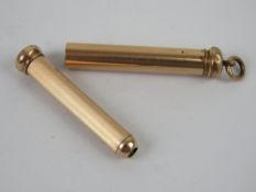 A gilded metal propelling pencil having chatelaine loop to top.