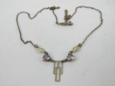 An Art Deco necklace having central geom