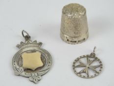 A HM silver thimble having floral decoration, hallmarked for Birmingham,