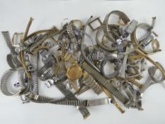 A quantity of assorted vintage and contemporary watch straps.