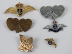 Four RAF sweetheart wings brooches inclu