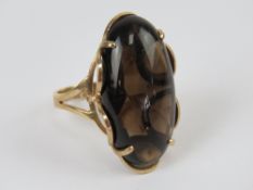 An impressive 9ct gold smoky quartz cocktail ring