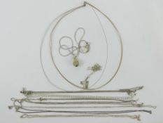 Two silver chain necklaces with pendants