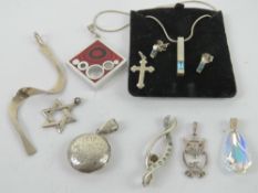 A 925 silver locket of round form having