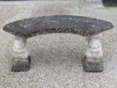 A carved stoneware garden seat raised over twin carved rabbit supports 100 x 42cm.