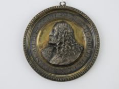A silvered medallion having the bust in relief of Alberti Dureri (painter, engraver, print maker,