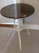 A circular occasional table with mahogany top, 61cm dia,