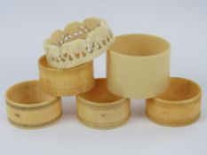 A set of four Victorian turned ivory napkin rings,