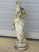 A contemporary stoneware garden figurine in the form of a classical lady, 68cm high.