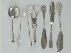 A Scottish silver butter knife having thistle design upon and hallmarked Edinburgh 1973-74,