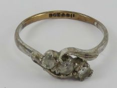 A 9ct gold and silver ring having three white stones upon, size P-Q, 1.9g.