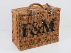 A Fortnum & Masons wicker breakfast hamper with leather straps 30 x 25 x 15cm.