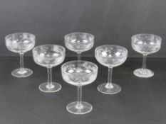 A quantity of six matching champagne saucers.