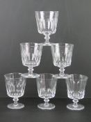 A quantity of six large glass footed tumblers.