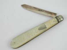 A HM silver fruit knife having mother of pearl handle, hallmarked Sheffield 1894, 12.3cm when open.