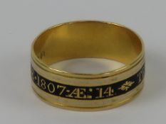 A superb 22ct gold Georgian mourning ring having central black enamel band 'Thos Blackhall. OB: 1.