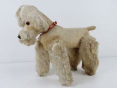 A vintage jointed poodle c1970s.