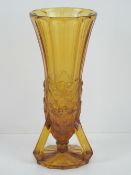An Art Deco amber glass open footed vase by Jobling, catalogue number 11600,