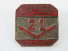 A HM silver United Automobile Services badge having red enamel for '21 Years Service' No 953,