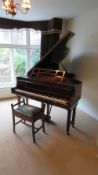 A mahogany Collard & Collard baby grand piano having three double tapering square cut legs,