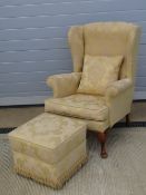 A single re-covered upholstered wingback chair in smart golden fabric with matching cushion and
