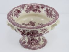 A Mason's Ironstone pedestal bowl having puce floral decoration throughout, 24cm diameter.