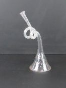 A single hand blown double spiral Edwardian glass dinner horn standing 20cm high in fully working