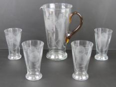 A c1930s lemonade set comprising jug and four matching glasses.