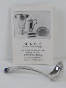A Hart Gold & Silversmiths HM silver short ladle having blue cabachon to handle,