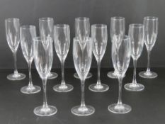 A set of twelve French made champagne flutes.