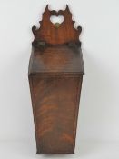 A fine Georgian mahogany tapering candle or taper box, having geometric crossbanded decoration,