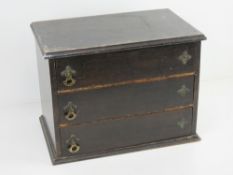A vintage wooden three drawer tool chest, 37 x 24 x 27cm, a/f.